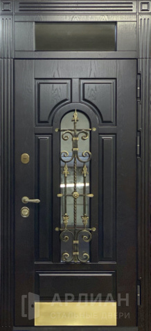 Фото «Высокая парадная дверь с фрамугой стеклом и ковкой №36»
